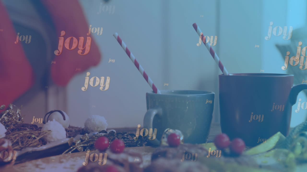 크리스마스 장식품과 뜨거운 초콜릿 컵 위에 떨어지는 기의 애니메이션 텍스트