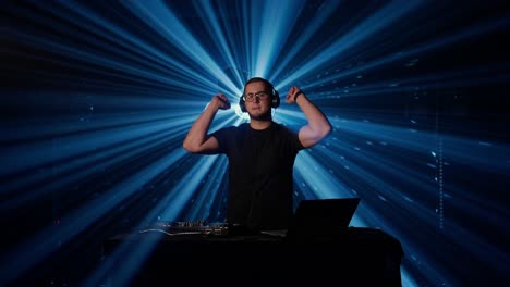 dj performance under blue light