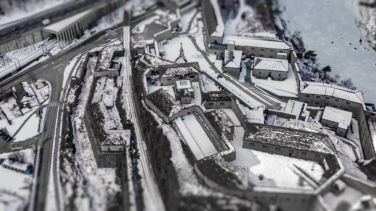 Aerial view of the Fortezza Fortress in the Valle Isarco Valley, South Tyrol, Italy. One of the most impressive fortifications of the Alpine area. There is a highway nearby,  with busy traffic.