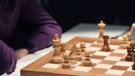 stunning view over an warmly lighted wooden tournament chess board