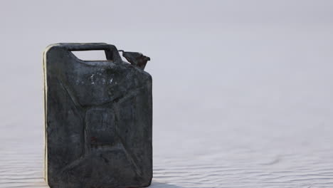 rusty jerrycan on the ground