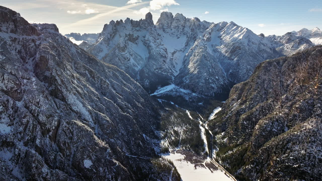Aerial drone view of snow on the Cristallo mountain, in the Dolomites, Italy