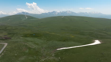 Slope-Mountains-And-Green-Fields-At-Ktsia-Tabatskuri-Managed-Reserve-In-Samtskhe-Javakheti-Region-of-Georgia