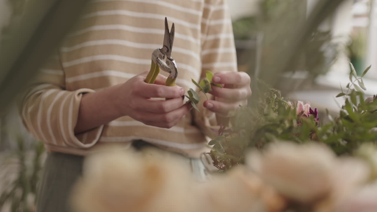 Florist Arranging a Bouquet