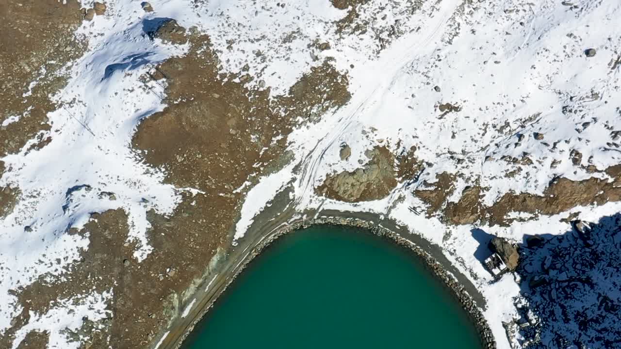 Turquoise lake  Valais Alps, Zermatt, Switzerland, Europe. Drone shot