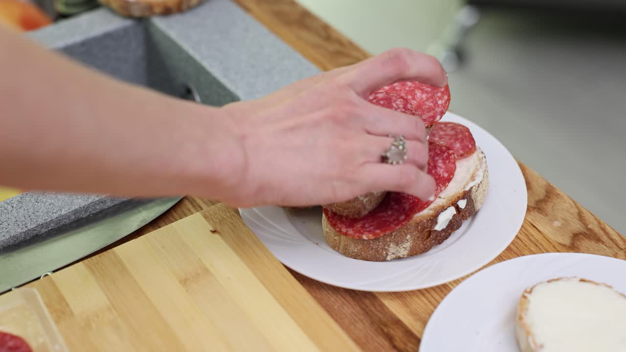 Making Salami Sandwiches