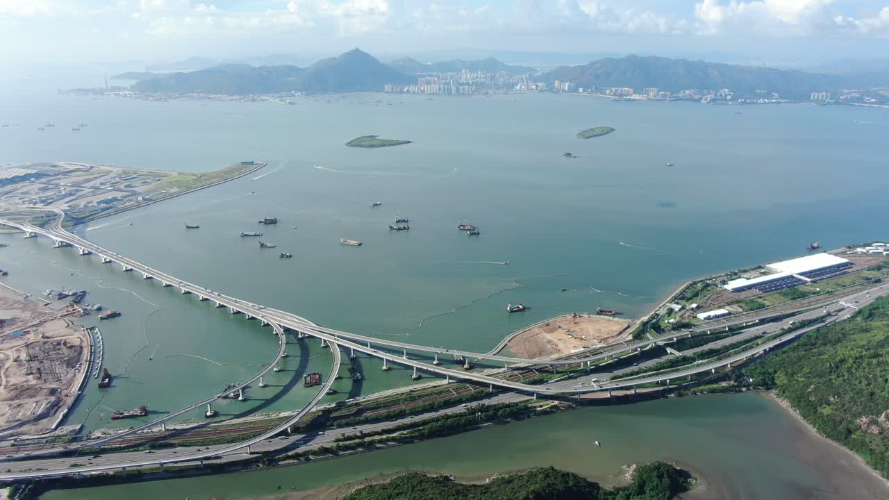 instalaciones de cruce fronterizo de hong kong y puente principal y sistema de carreteras en construcción, vista aérea