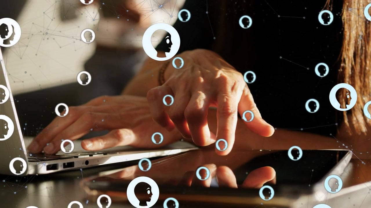 Woman tapping tablet, initiating profile icons for network tasks, fingers shifting to typing laptop