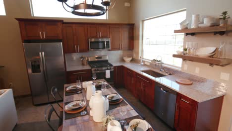 lower to end of large dining room table in kitchen