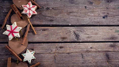 nieve cayendo con decoraciones de navidad en madera