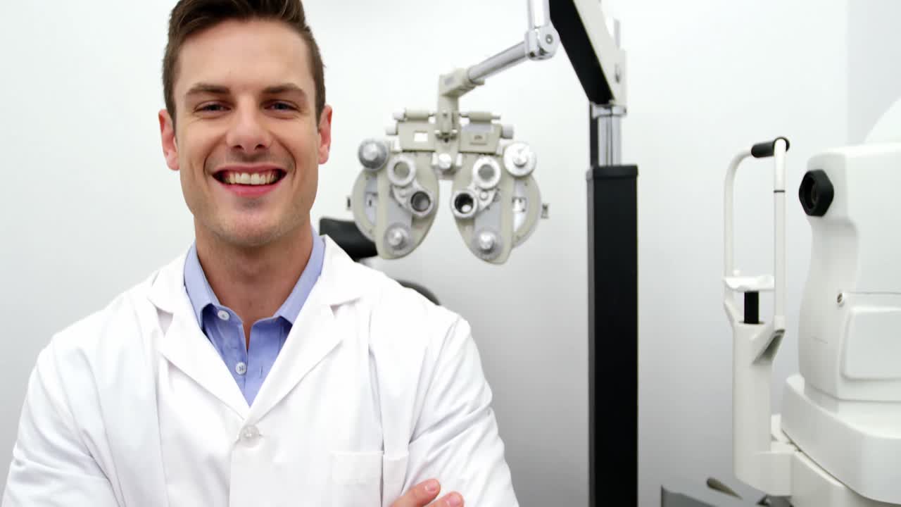 Portrait of smiling optometrist