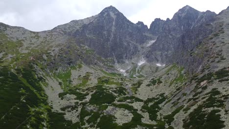 Drone-tilting-and-panning-up-mountain-range-in-Slovakia,-Europe