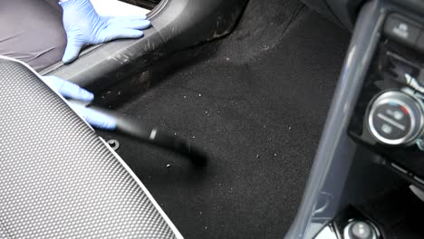 hovering dirty car interior carpet