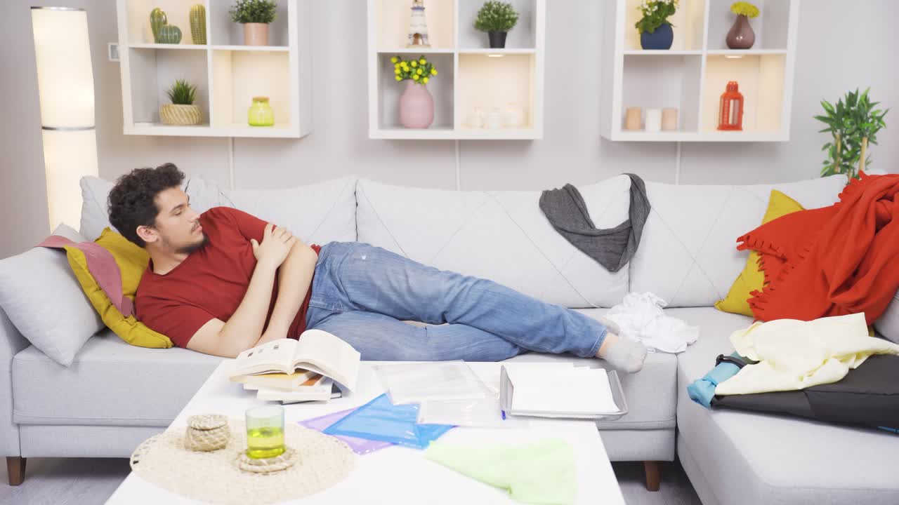 Lazy man is sleeping at home.