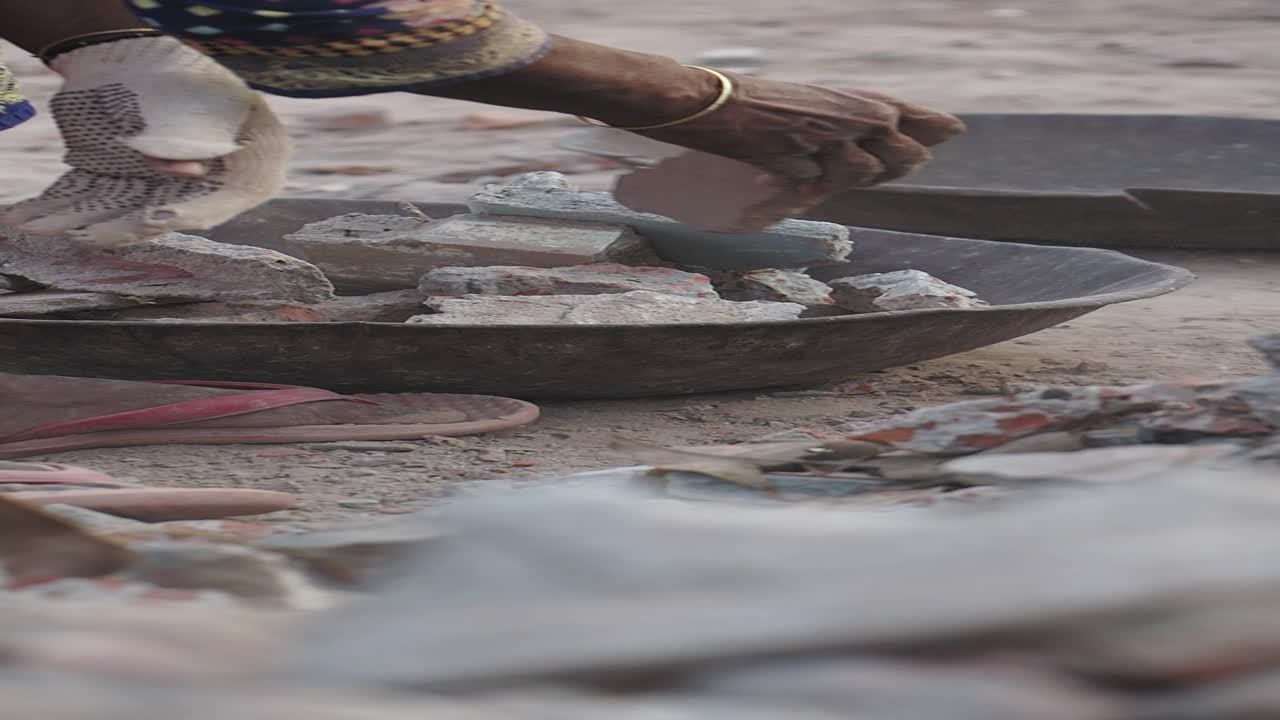 Woman Recycling Construction Debris