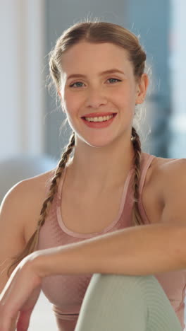 smiling woman in fitness clothes