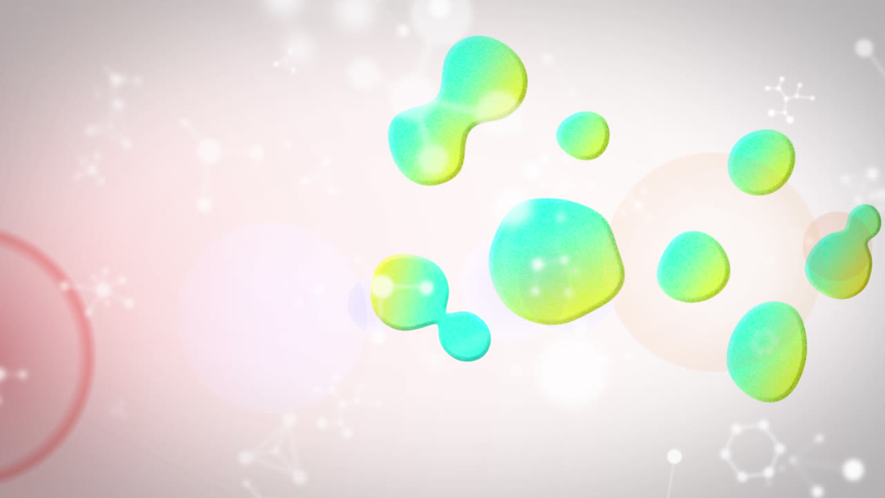 Animation of blue and yellow liquid droplets with molecules moving on illuminated lens flare