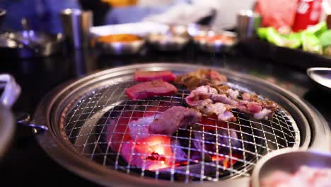 meat grilling on a korean bbq grill