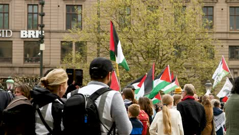 pro palestine protesters march against israel’s eurovision participation in malmö (sweden), calling for a ceasefire on the war in gaza, eurovision song contest 2024, medium handheld shot