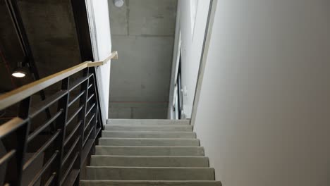 looking up the stairs of a modern downtown city loft