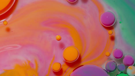 abstract colorful fluid art with oil bubbles