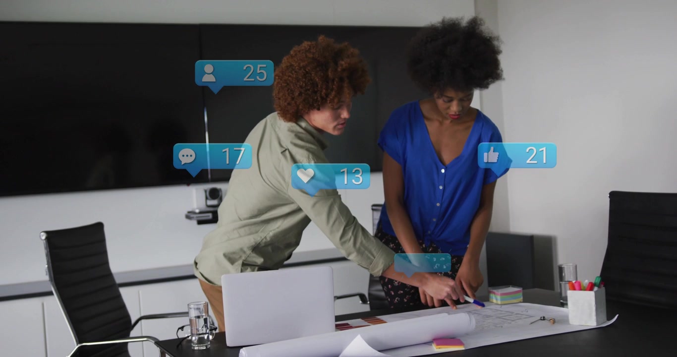 Design duo leaning and tracing plan, holding paper, causing likes icons rising boosting engagement