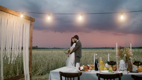 young couple in love in a fall field