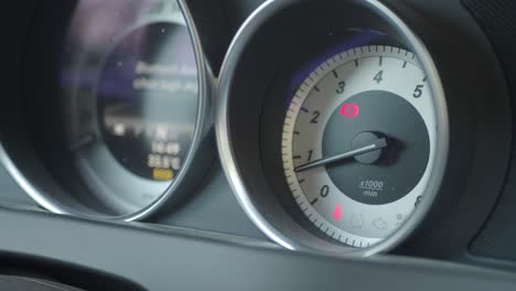 close-up of a car dashboard with illuminated warning lights