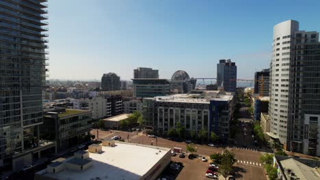 downtown san diego flying south towards the library and the coronado bridge