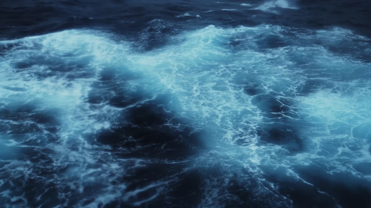 Le onde blu scure dell'oceano di notte