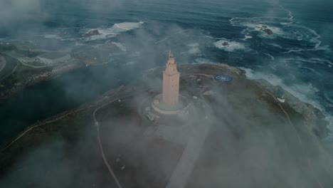 aerial view of coastal lighthouse on top of hill, roman tower of hercules in coruña, galicia spain