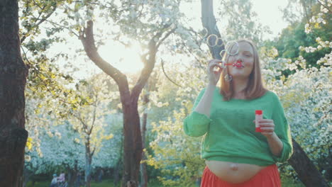 mother-to-be and soap bubbles