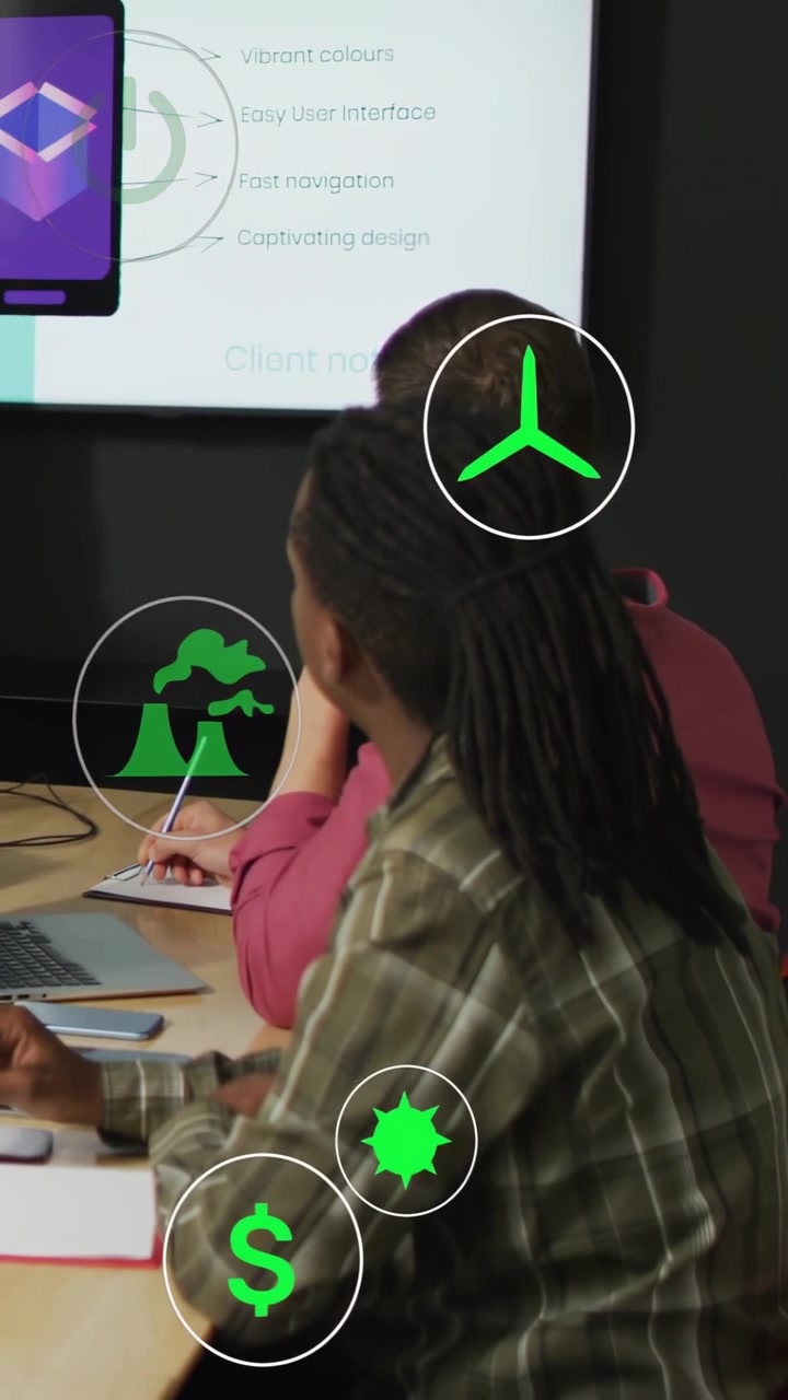 Vertical video: Woman noting design while host pointing causing green icons over heads showing UI