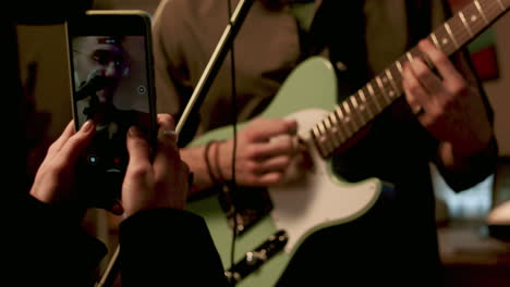 young man playing guitar