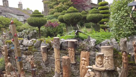 footage taken from the outside sales area of a village craftshop showing wooden carvings