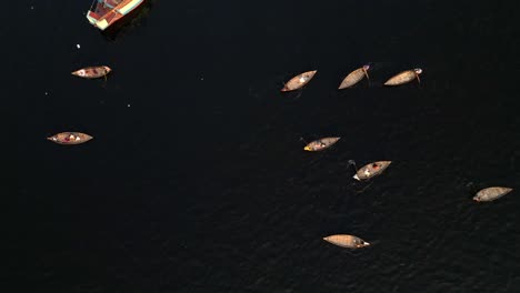 birds eye view drone shot small fishing boats on buriganga river