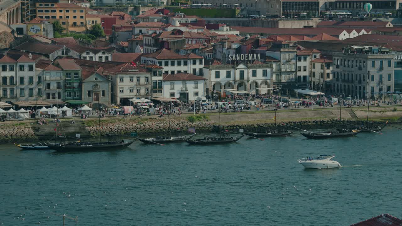 Historic rabelo boats moored by Porto waterfront on the Douro River