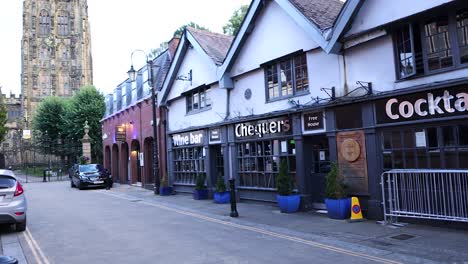 a quiet street with historic buildings