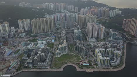 drone footage of tseung kwan o city, hong kong