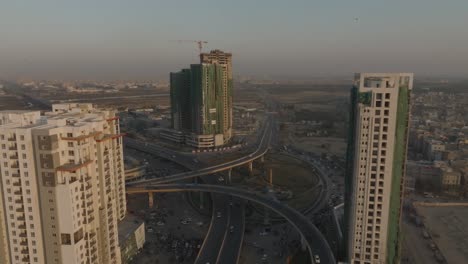 aerial shot of under construction building of karachi during morning time