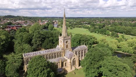 establishing low aerial view from holy trinity church to reveal stratford upon avon countryside english town landscape