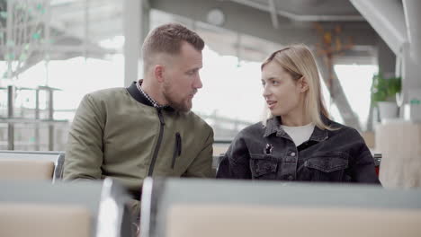 couple waiting at airport