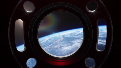 a view of earth from a spacecraft window