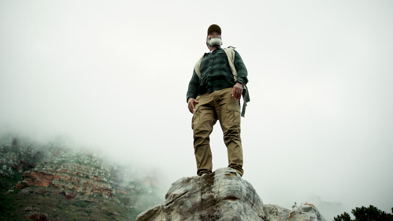 Man hiking on a mountain top