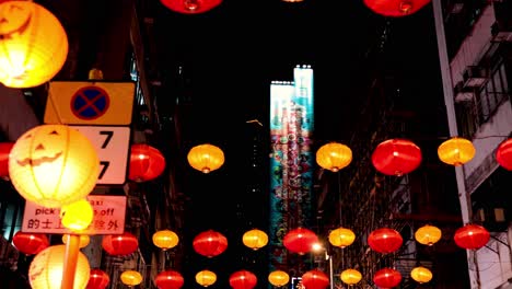 colorful lanterns light up a bustling street