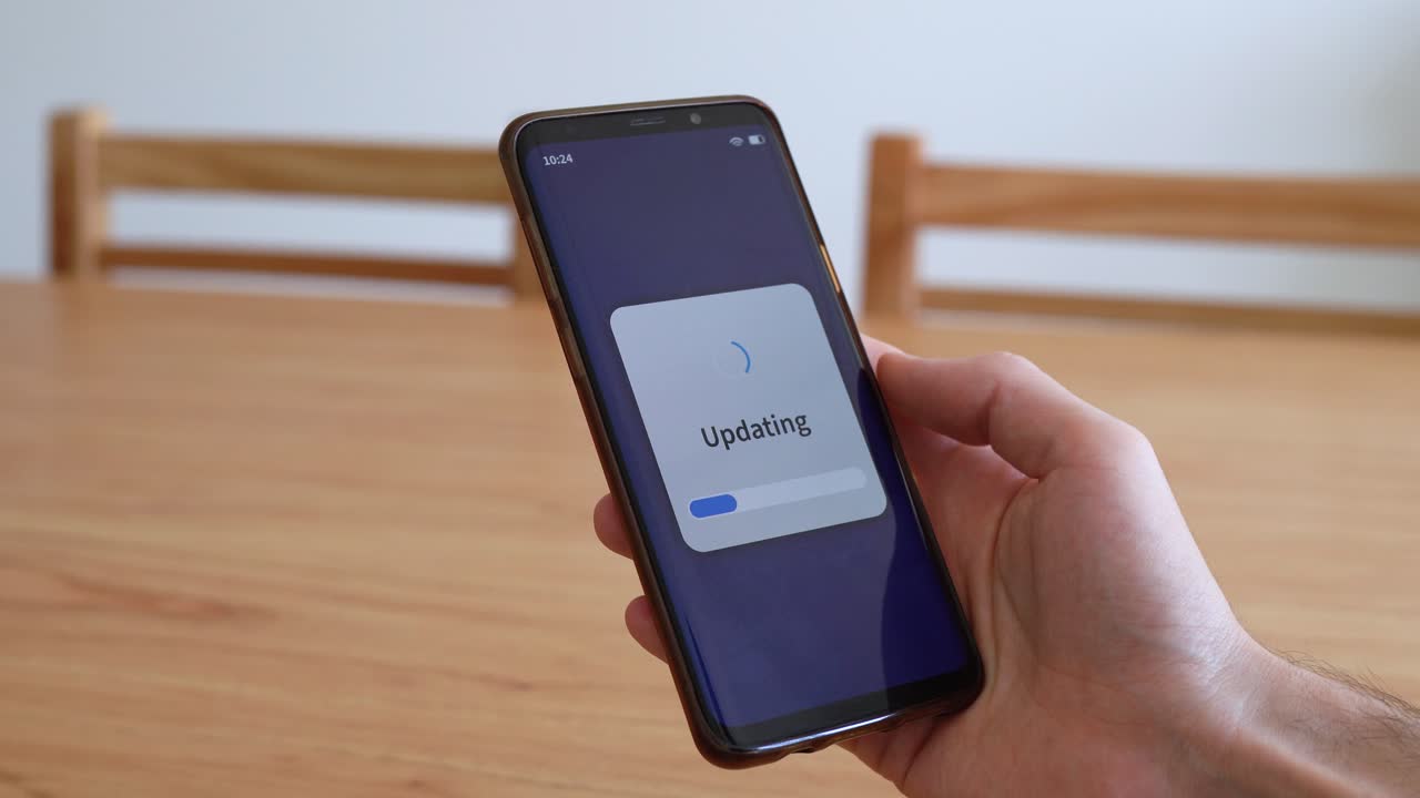 Updating apps and software on your phone. Waiting to get new updates installed