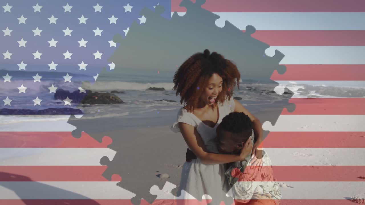 rompecabezas sobre la bandera estadounidense contra una pareja afroamericana abrazándose en la playa