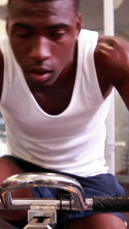 fit man working out on the exercise bike
