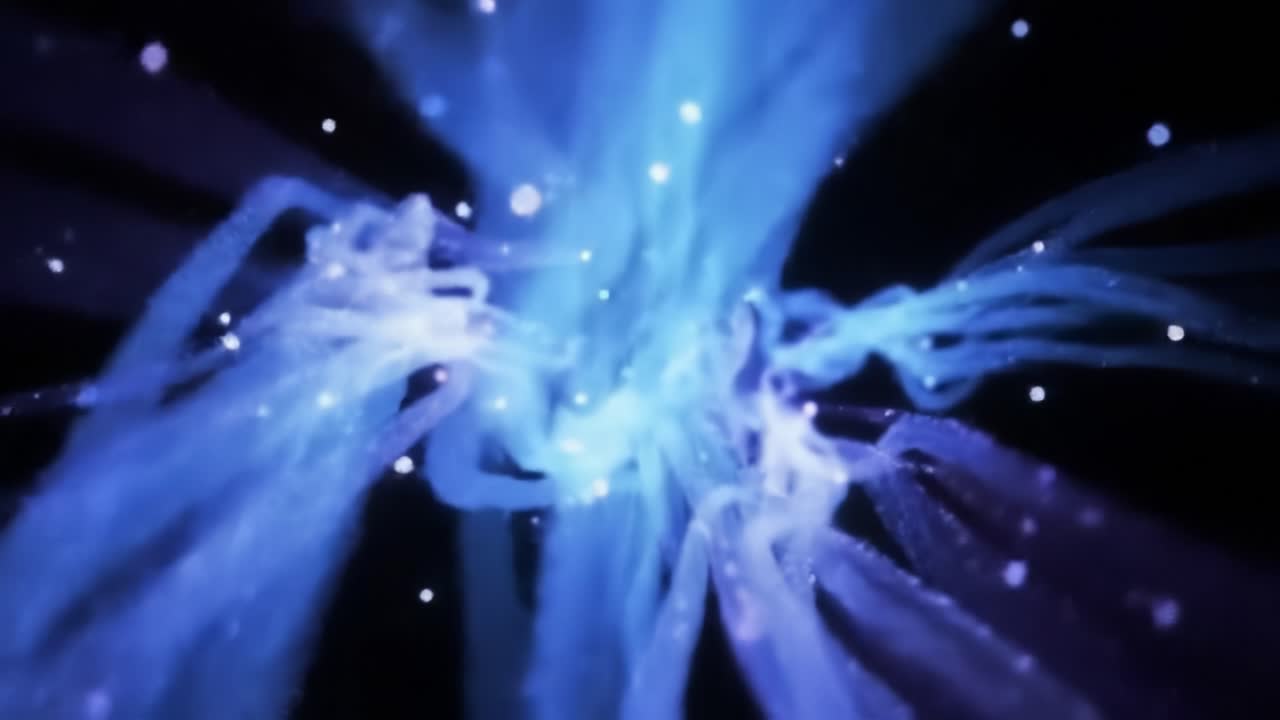 Explore an abstract representation of blue and purple energy waves flowing together in a captivating cosmic landscape. Discover the beauty of movement and color in this enchanting display.