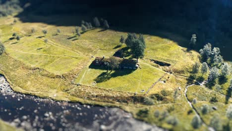 aerial view of the traditional sod roof house on the river bank